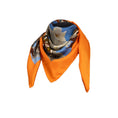 Load image into Gallery viewer, Silk scarf with Orange Bird of Paradise and White-Blue Cherry Blossom print, displayed as a cutout around an invisible mannequin's neck to highlight its intricate design.