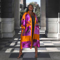 Load image into Gallery viewer, Women's Bird of Paradise Pink Purple Plus Size and Mid Size Silk Kimono styled with the Boudicca Black Dress and gold chain heels for an elegant look.