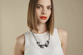Load image into Gallery viewer, kodes-statement-necklace-geometric-silicone-black-white-monochrome-necklace-KS0048b-0006-scaled.jpg.webp