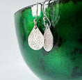 Load image into Gallery viewer, Teardrop Daisy Hand Stamped Sterling Silver Earrings
