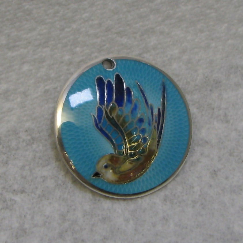 tattoo style swallow of hope enamelled silver pendant