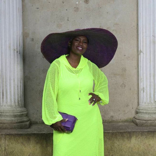 Women's Plus Size Aphrodite Neon Lime Holiday Resort Dress with matching neon lime undergarment and hoodie, styled with a purple sunhat, handbag,  for a elegant holiday look.