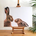 Load image into Gallery viewer, Kissing Hares - limited edition giclée canvas print
