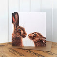 Load image into Gallery viewer, Kissing Hares Greetings Card
