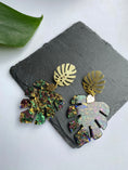 Load image into Gallery viewer, Multicoloured Monstera Leaf Earrings, Leaf Shaped Stud Earrings for Ladies, Rainbow Glitter Acrylic Charm Earrings, Gold Plated Jewelry
