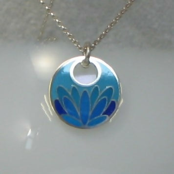 Lotus flower inspired vitreous enamelled sterling silver round pendant