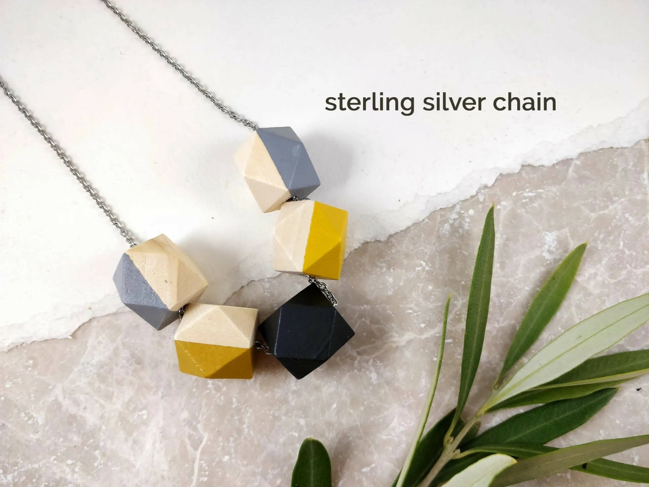geometric-necklace-grey-mustard-5ec40e6e-scaled.jpg.webp