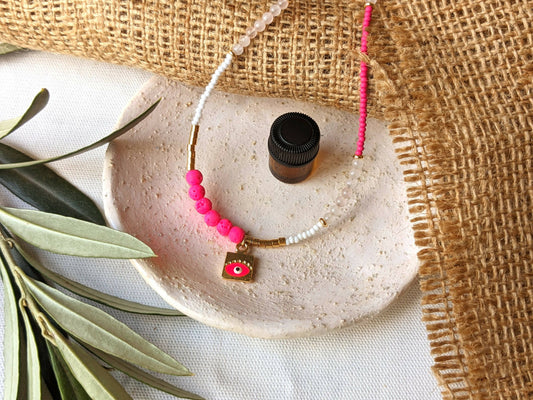 Essential Oil Diffuser Necklace with Enamel Evil Eye bead, Rose Quartz, Lava beads, Preciosa Czech beads | Aromatherapy Necklace