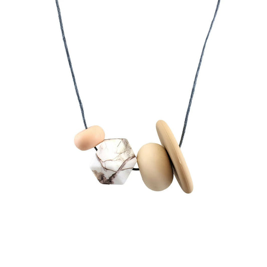 statement-silicone-necklace-white-brown-peach-610c34ab.jpg.webp